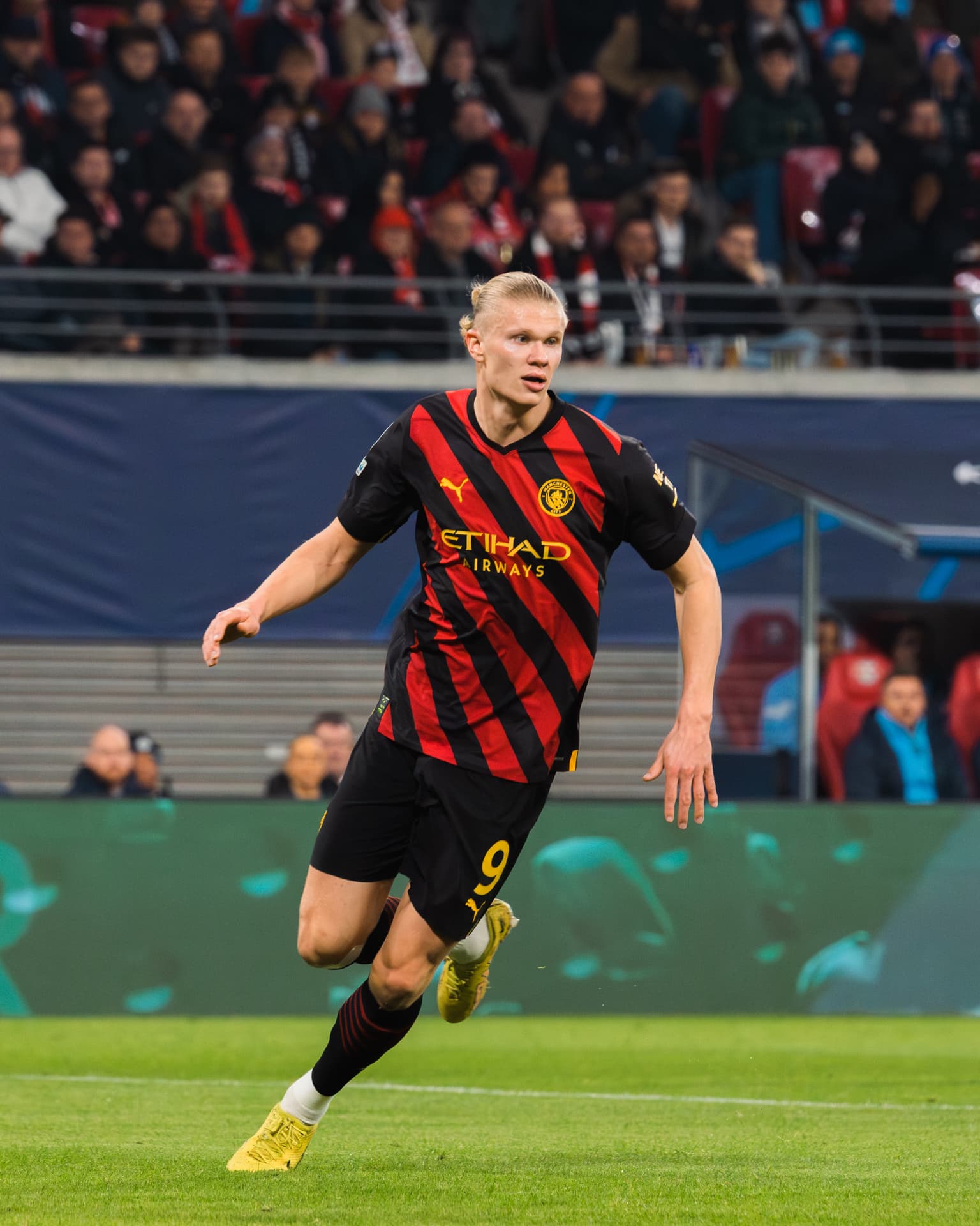 Erling Haaland celebrating in a Manchester City shirt